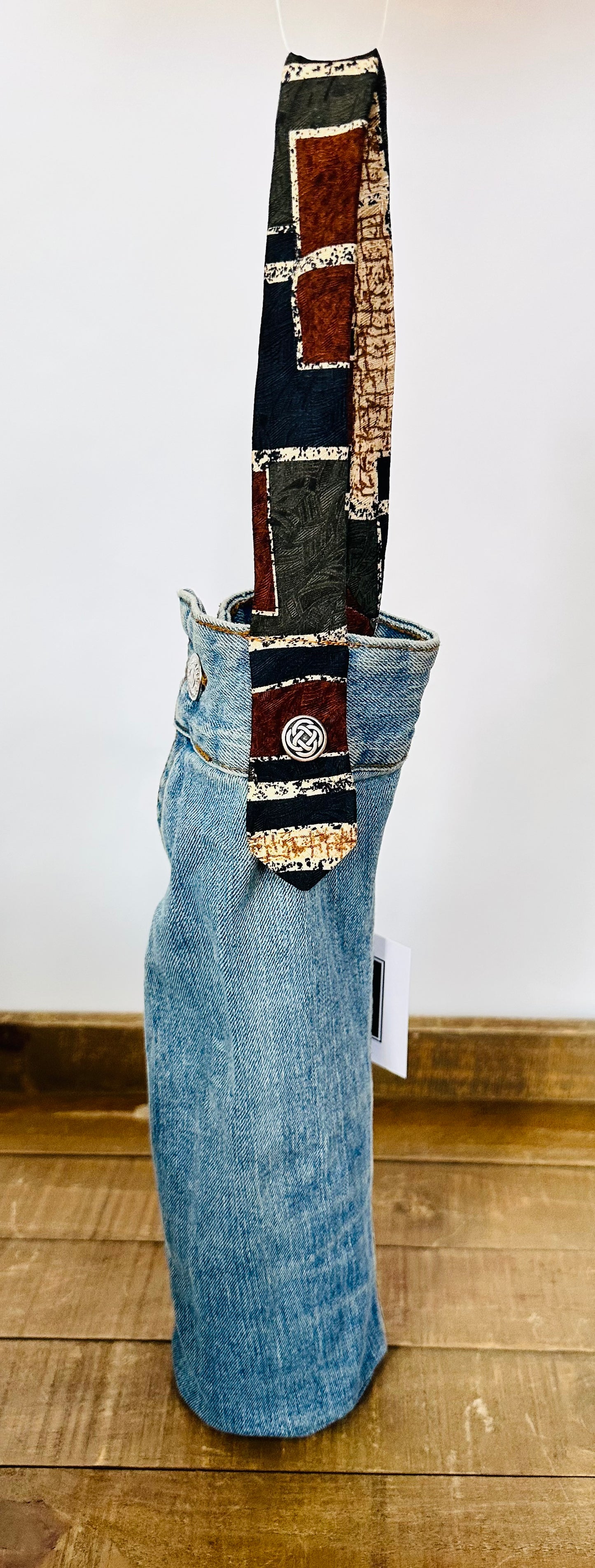 medium wash denim + abstract earthy tie wine sleeve