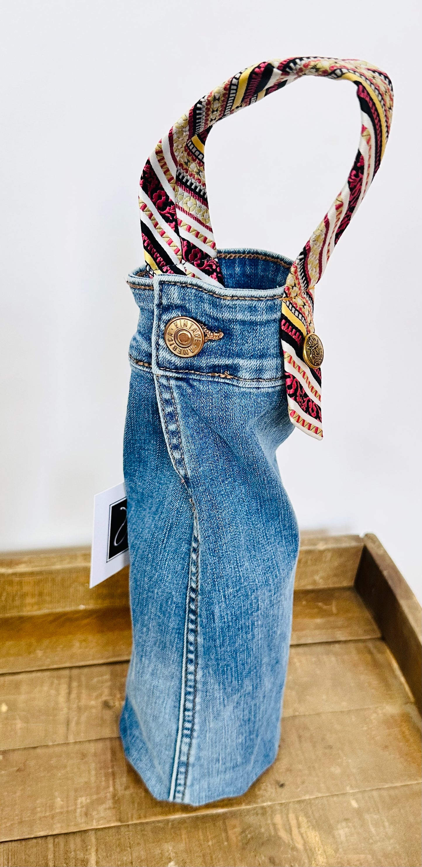 blue wash denim + multi color striped tie wine sleeve