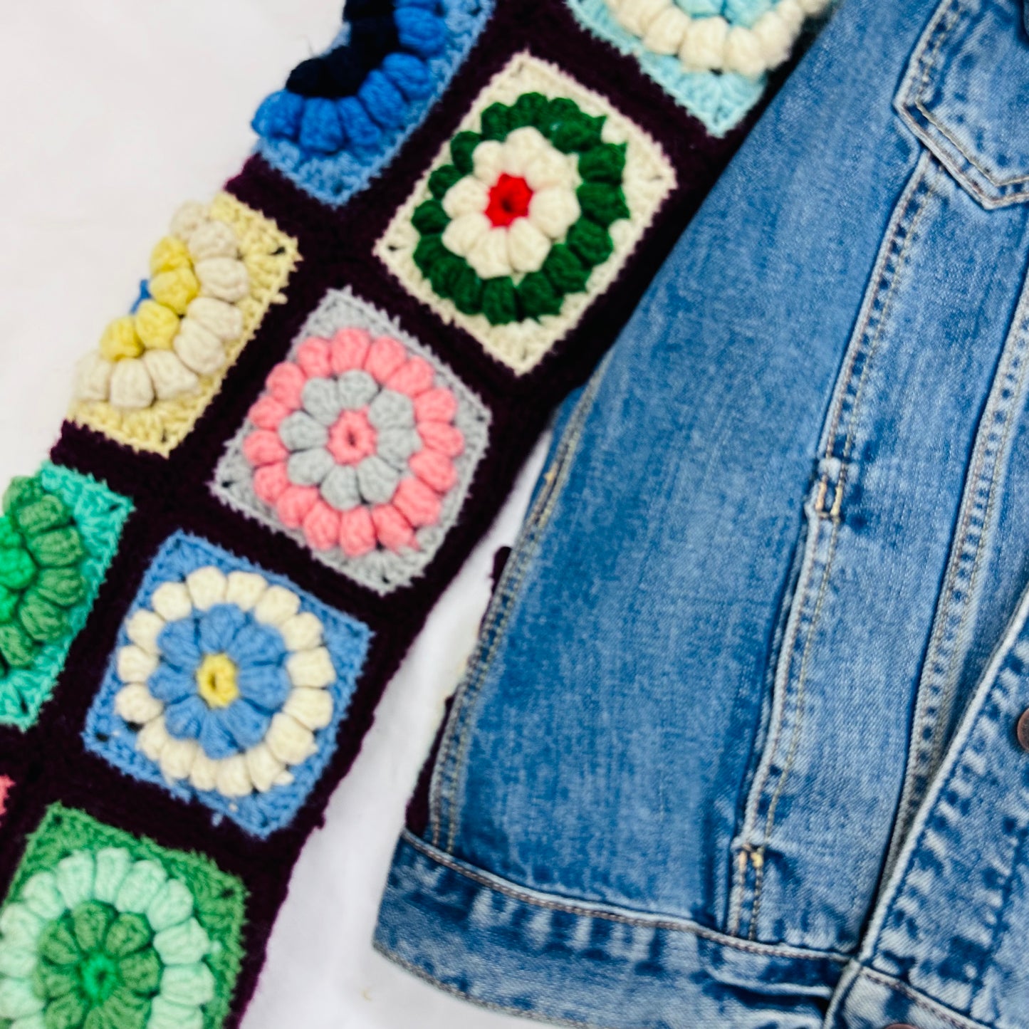 classic denim jacket meets colorful floral crochet