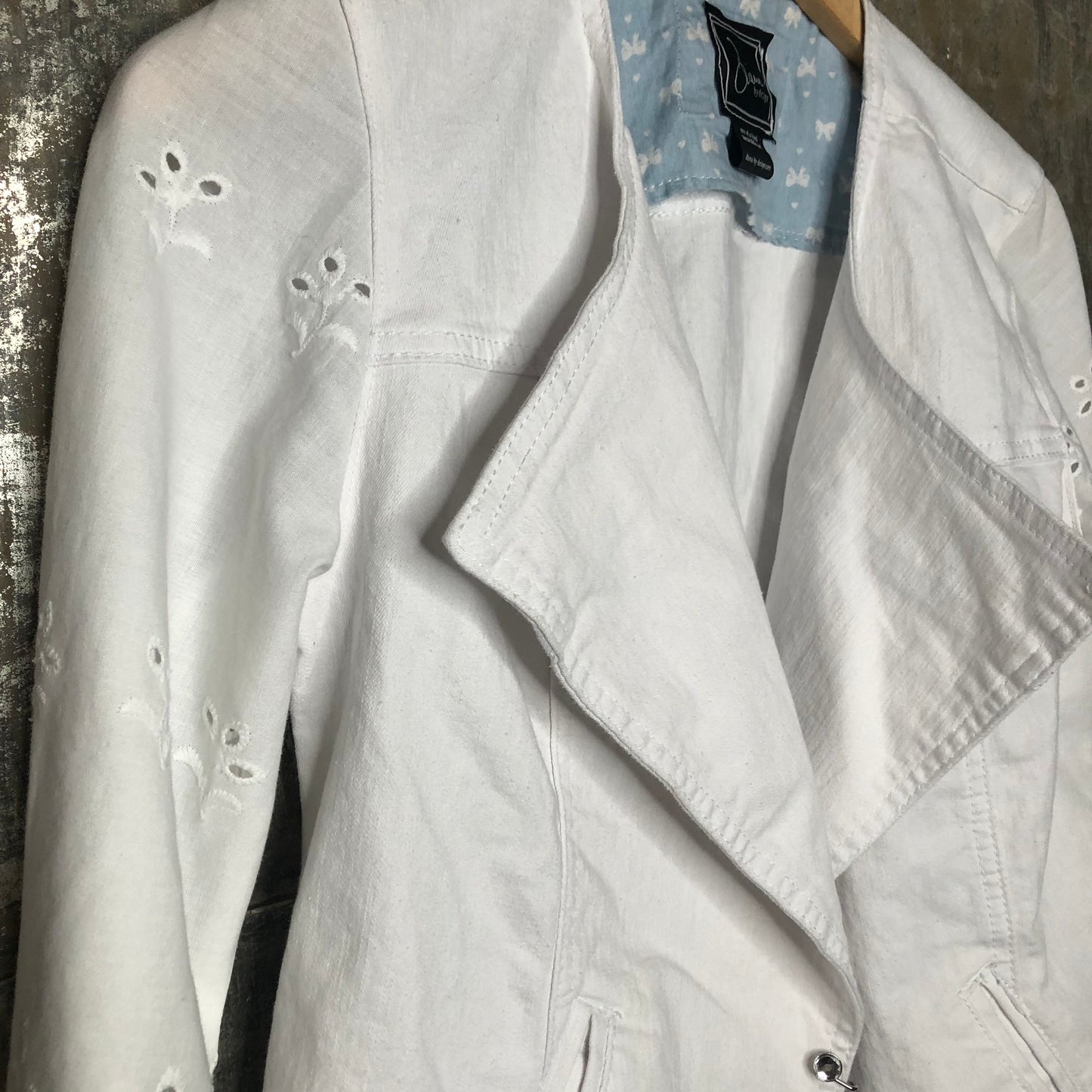 eyelet bells + feminine tailored white denim jacket