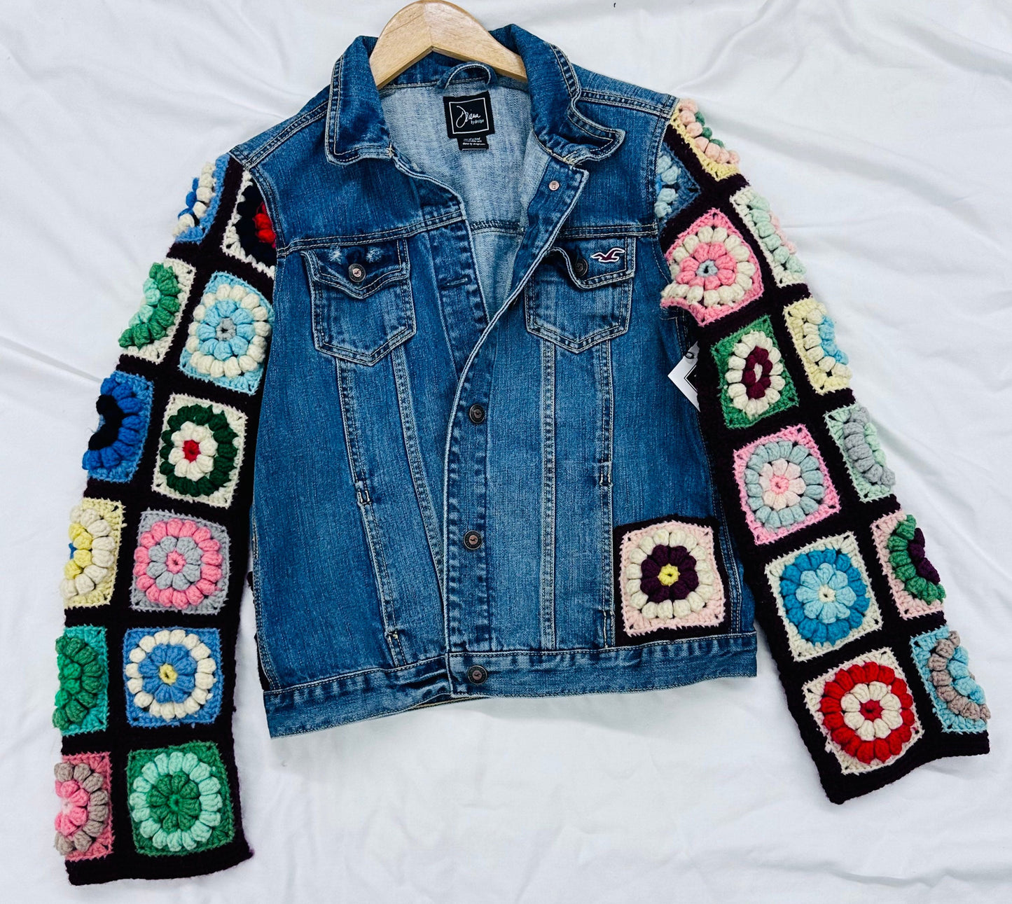 classic denim jacket meets colorful floral crochet