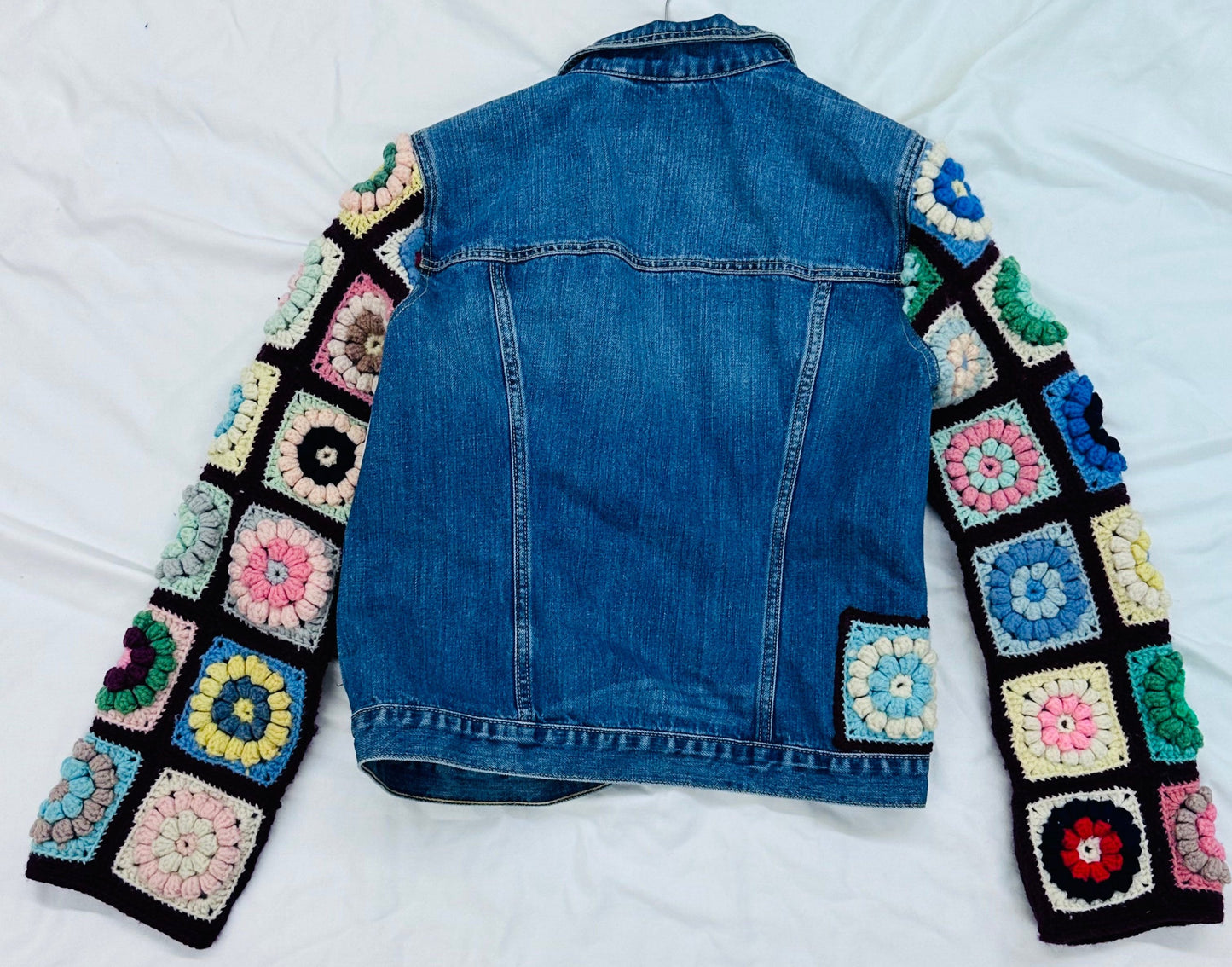 classic denim jacket meets colorful floral crochet