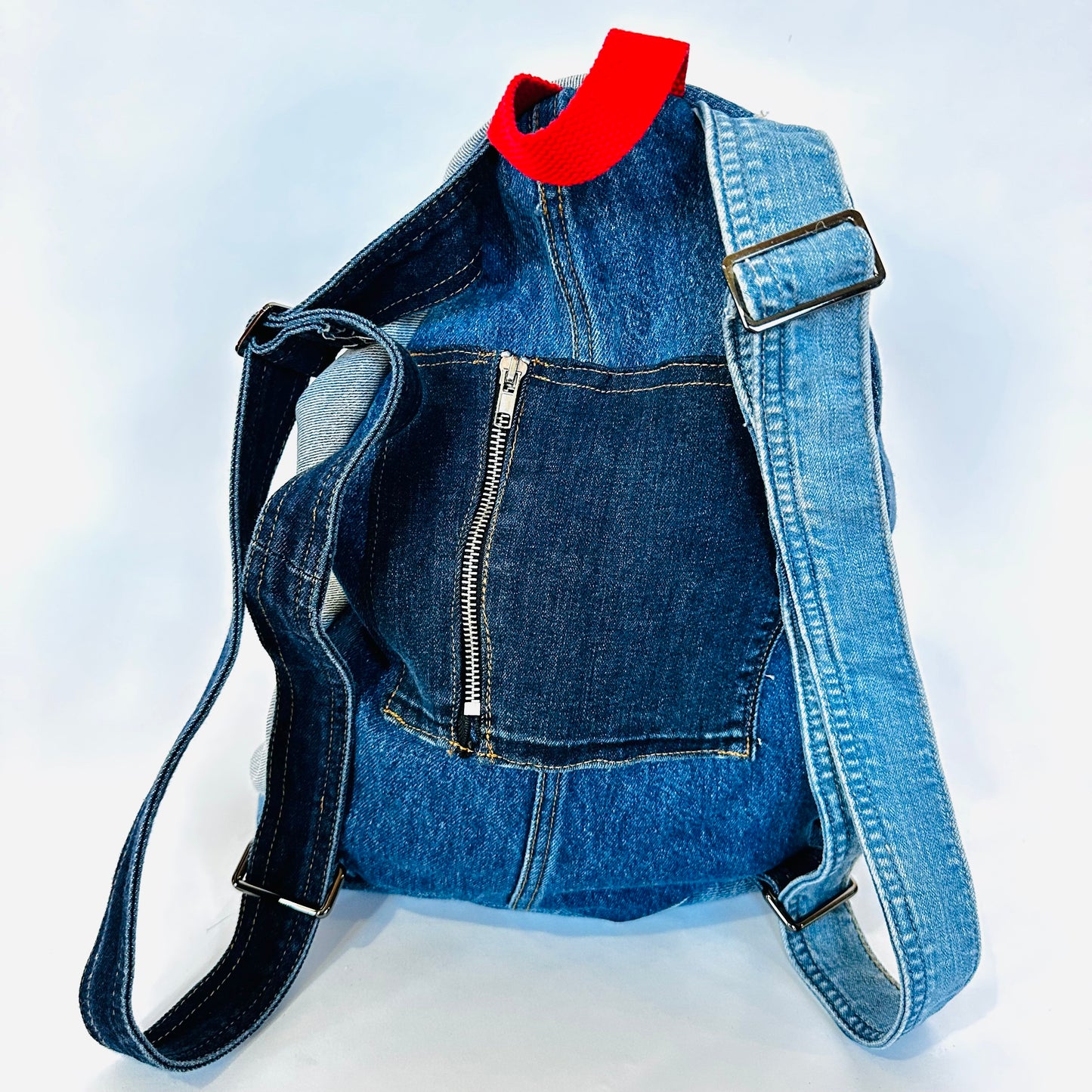 denim sling backpack