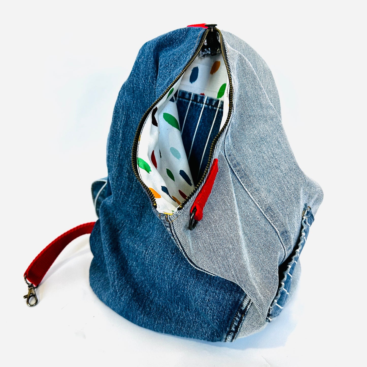 denim sling backpack