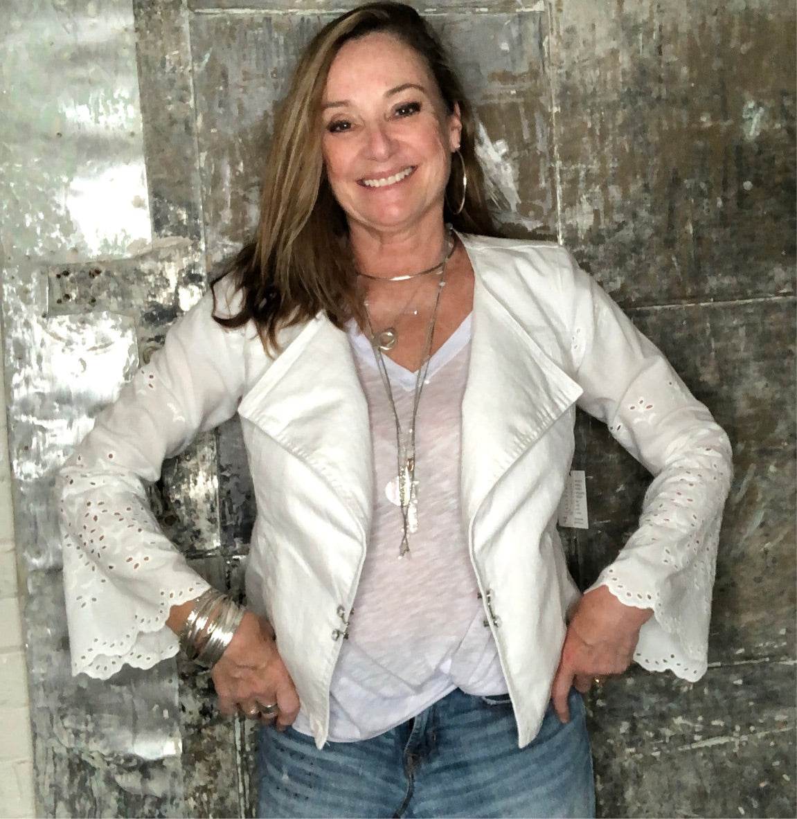 eyelet bells + feminine tailored white denim jacket